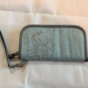REI Green Wallet with Artistic Design